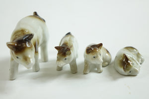 Set of 4 Porcelain European Pigs Figurines