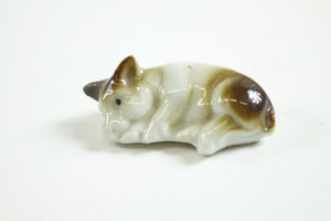 Set of 4 Porcelain European Pigs Figurines