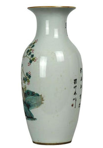 A Pair of Antique Chinese Porcelain Vases with markings on the bottom
