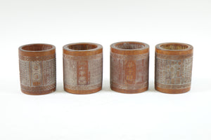 Four Heavily Carved Chinese Cylinder Wood Vases