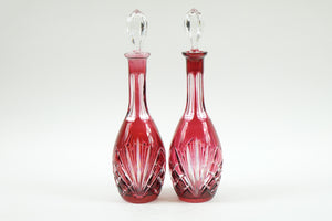 Two Czech Hand Carved Glass Bottles with tops